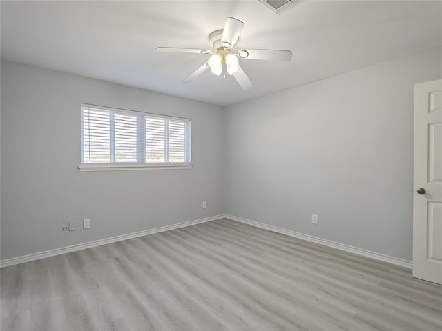 8818 Roos Rd, Houston, TX 77036 - unfurnished room with light wood-type flooring and ceiling fan