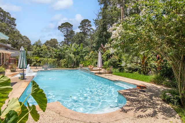 355 Cumberland Trl, Conroe, TX 77302 - view of swimming pool with a patio