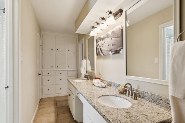 355 Cumberland Trl, Conroe, TX 77302 - bathroom featuring double vanity and tile patterned flooring