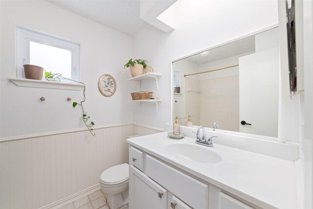 3543 Acorn Springs Ln, Spring, TX 77389 - full bathroom featuring vanity, a shower, and wainscoting