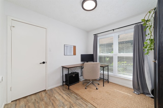 3543 Acorn Springs Ln, Spring, TX 77389 - office area featuring wood finished floors and a textured ceiling