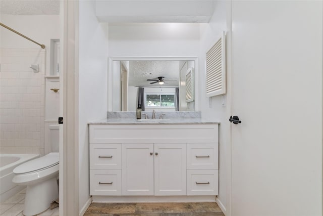 3543 Acorn Springs Ln, Spring, TX 77389 - bathroom with vanity, shower / bath combination, ceiling fan, and a textured ceiling