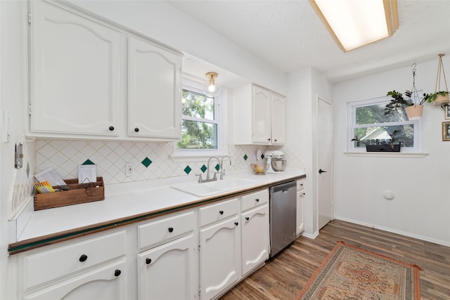 3543 Acorn Springs Ln, Spring, TX 77389 - kitchen featuring dishwasher, wood finished floors, decorative backsplash, white cabinets, and light countertops