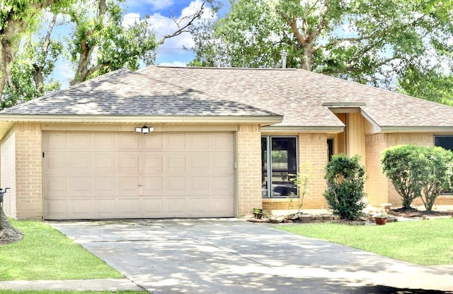 16307 N Mist Dr, Houston, TX 77073 - ranch-style house with brick siding, roof with shingles, a garage, and driveway