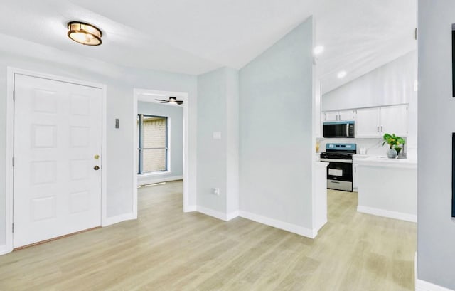 16307 N Mist Dr, Houston, TX 77073 - entrance foyer with light wood finished floors and vaulted ceiling