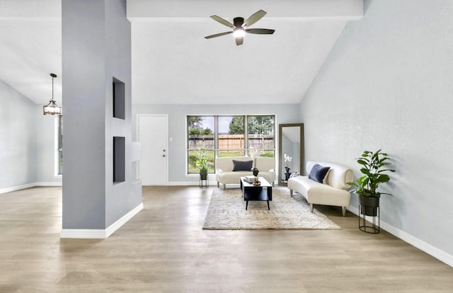 16307 N Mist Dr, Houston, TX 77073 - living area featuring high vaulted ceiling, light wood-style flooring, and a ceiling fan