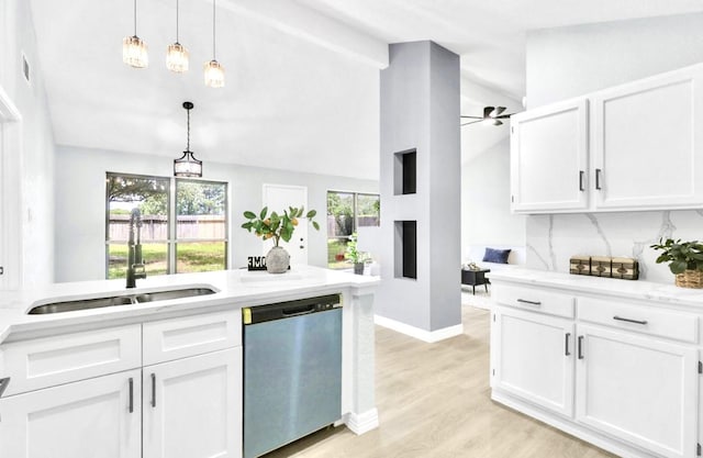 16307 N Mist Dr, Houston, TX 77073 - kitchen with dishwasher, white cabinetry, pendant lighting, ceiling fan, and light wood finished floors