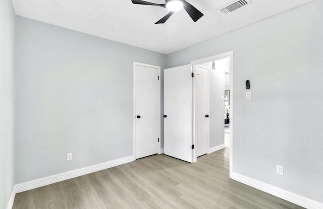 16307 N Mist Dr, Houston, TX 77073 - unfurnished bedroom with wood finished floors and a ceiling fan