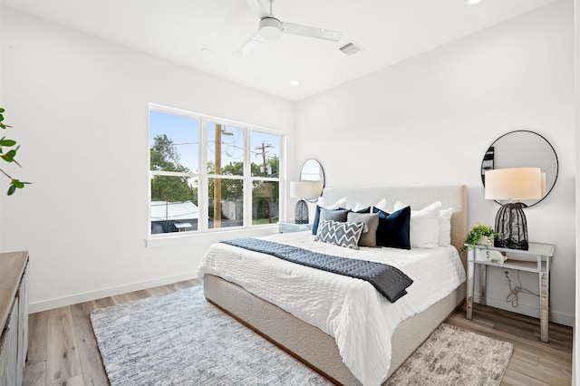 6417 Madrid St, Houston, TX 77021 - bedroom featuring light wood finished floors and ceiling fan