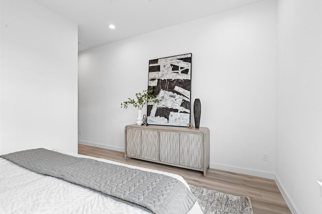 6417 Madrid St, Houston, TX 77021 - bedroom with wood finished floors and recessed lighting