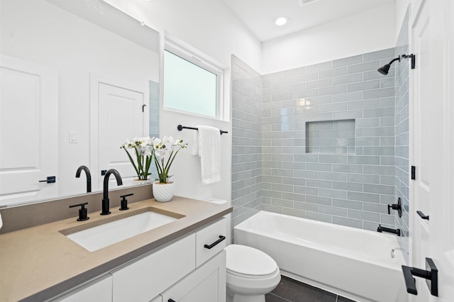 6417 Madrid St, Houston, TX 77021 - full bathroom featuring vanity, washtub / shower combination, and recessed lighting