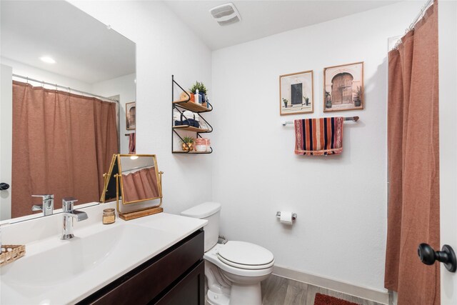 14706 Sweet Water Dr, Baytown, TX 77523 - bathroom with vanity and wood finished floors