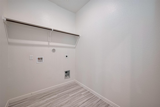 27222 Clear Breeze Dr, Katy, TX 77493 - laundry area with hookup for an electric dryer, gas dryer hookup, light wood-style floors, and washer hookup