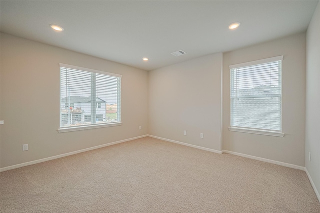27222 Clear Breeze Dr, Katy, TX 77493 - unfurnished room with healthy amount of natural light, light colored carpet, and recessed lighting