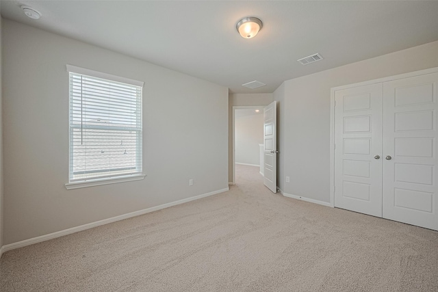 27222 Clear Breeze Dr, Katy, TX 77493 - unfurnished bedroom with carpet floors and a closet