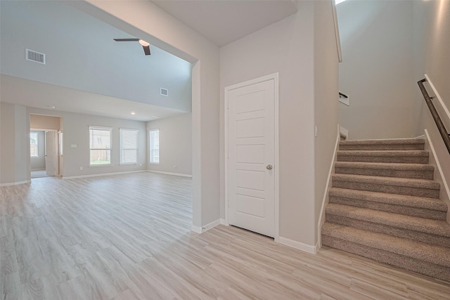 27222 Clear Breeze Dr, Katy, TX 77493 - staircase featuring wood finished floors and a high ceiling