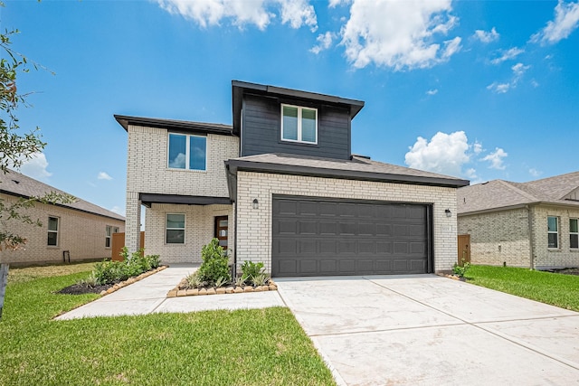 27222 Clear Breeze Dr, Katy, TX 77493 - view of front of property featuring brick siding, concrete driveway, a front yard, and an attached garage