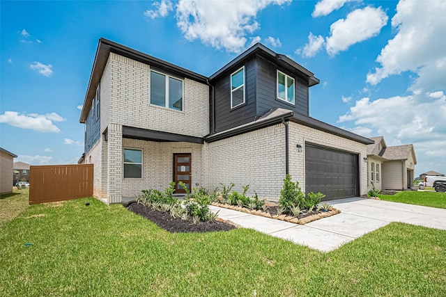 27222 Clear Breeze Dr, Katy, TX 77493 - view of front of house with driveway, a front yard, and brick siding