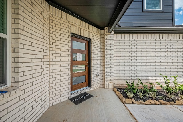 27222 Clear Breeze Dr, Katy, TX 77493 - view of exterior entry featuring brick siding