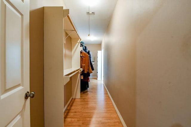 22035 Buescher Rd, Tomball, TX 77377 - spacious closet featuring light wood-style flooring