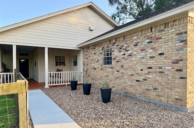 22035 Buescher Rd, Tomball, TX 77377 - view of side of home with brick siding