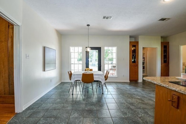 22035 Buescher Rd, Tomball, TX 77377 - dining room featuring baseboards