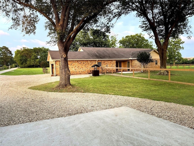 22035 Buescher Rd, Tomball, TX 77377 - ranch-style house with driveway