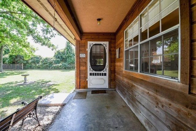 22035 Buescher Rd, Tomball, TX 77377 - entrance to property with a porch and a yard