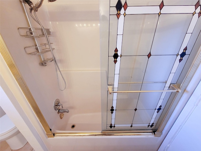 5439 Loch Lomond Dr, Houston, TX 77096 - bathroom featuring tub / shower combination and toilet