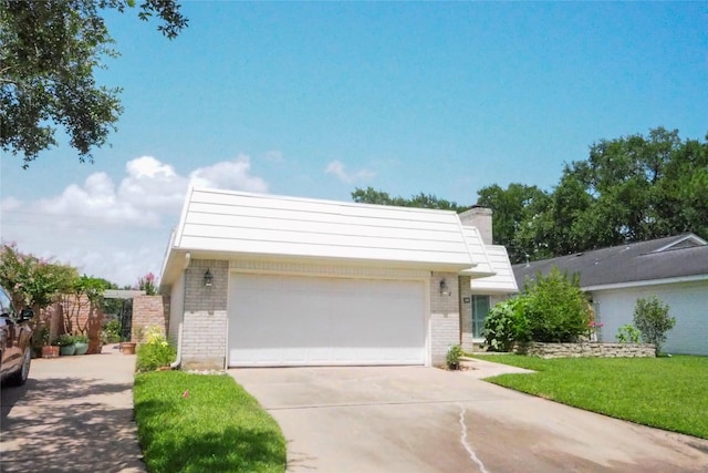5 Tiffany Sq, Sugar Land, TX 77478 - view of front facade with brick siding, concrete driveway, an attached garage, a front lawn, and a chimney