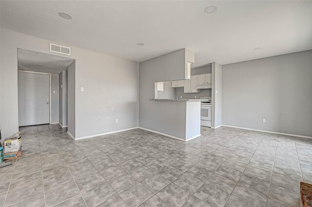 13480 S Thorntree Dr Unit 508, Houston, TX 77015 - unfurnished living room featuring light tile patterned floors