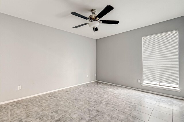 13480 S Thorntree Dr Unit 508, Houston, TX 77015 - spare room with ceiling fan and tile patterned flooring
