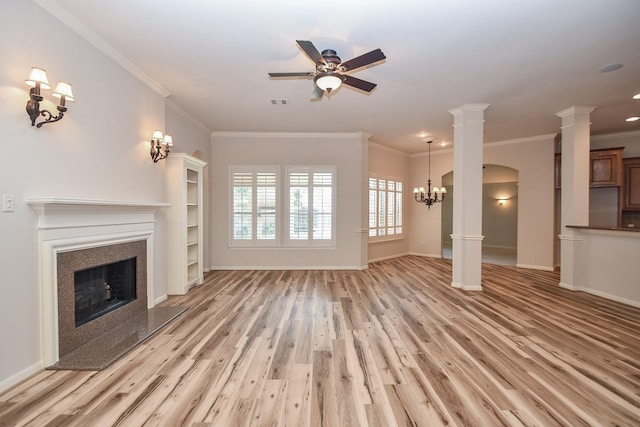 26622 Boulder Cove Ct, Katy, TX 77494 - unfurnished living room featuring a fireplace, light wood-style flooring, ceiling fan, crown molding, and recessed lighting