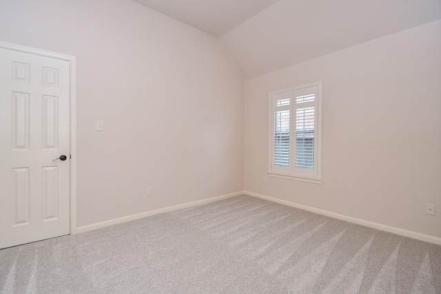 26622 Boulder Cove Ct, Katy, TX 77494 - carpeted spare room with lofted ceiling and baseboards