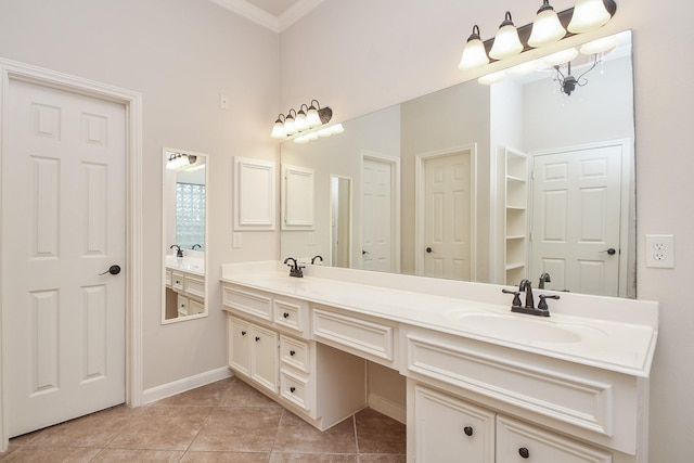 26622 Boulder Cove Ct, Katy, TX 77494 - bathroom with double vanity, tile patterned floors, a closet, a high ceiling, and ornamental molding