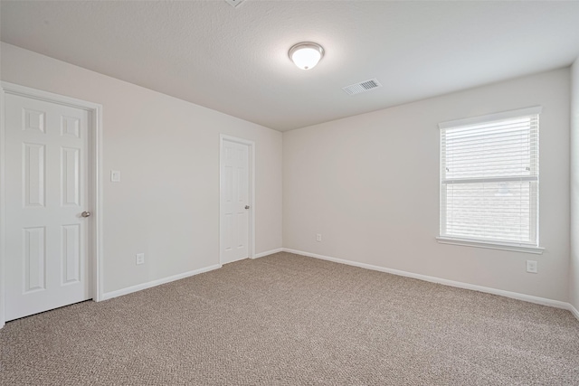 23607 Acerola Tree Ct, Katy, TX 77493 - carpeted spare room featuring baseboards
