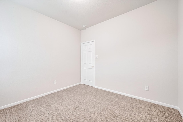 23607 Acerola Tree Ct, Katy, TX 77493 - empty room with light carpet and baseboards