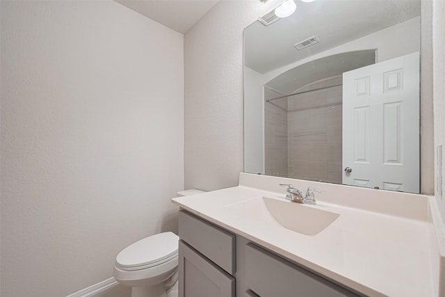 23607 Acerola Tree Ct, Katy, TX 77493 - bathroom featuring vanity, a textured wall, and a shower