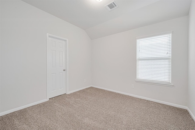 23607 Acerola Tree Ct, Katy, TX 77493 - carpeted empty room with vaulted ceiling and baseboards