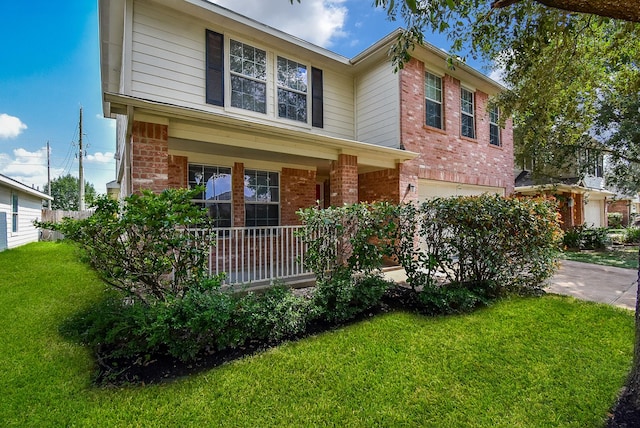 19727 Hon Ct, Katy, TX 77449 - traditional-style home with brick siding, a front yard, covered porch, and an attached garage