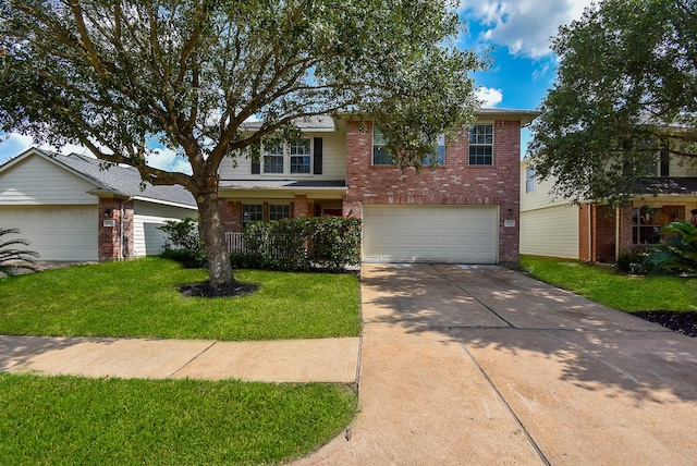 19727 Hon Ct, Katy, TX 77449 - view of front facade featuring brick siding, concrete driveway, a front yard, and a garage