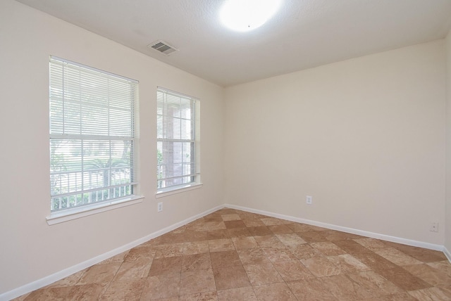 19727 Hon Ct, Katy, TX 77449 - spare room featuring baseboards