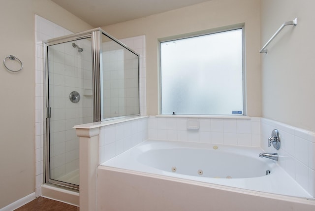 19727 Hon Ct, Katy, TX 77449 - full bathroom featuring a stall shower and a jetted tub