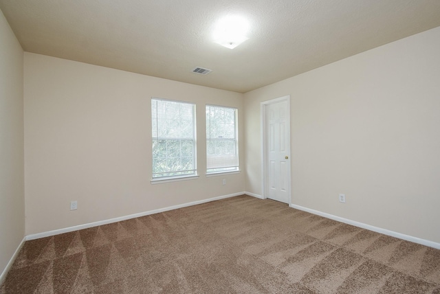 19727 Hon Ct, Katy, TX 77449 - spare room featuring carpet flooring and baseboards