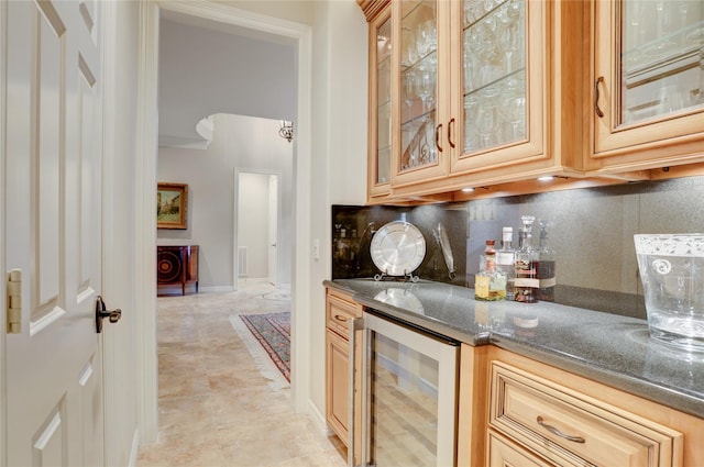 3207 Riviera Dr, Sugar Land, TX 77479 - indoor bar with wine cooler and tasteful backsplash