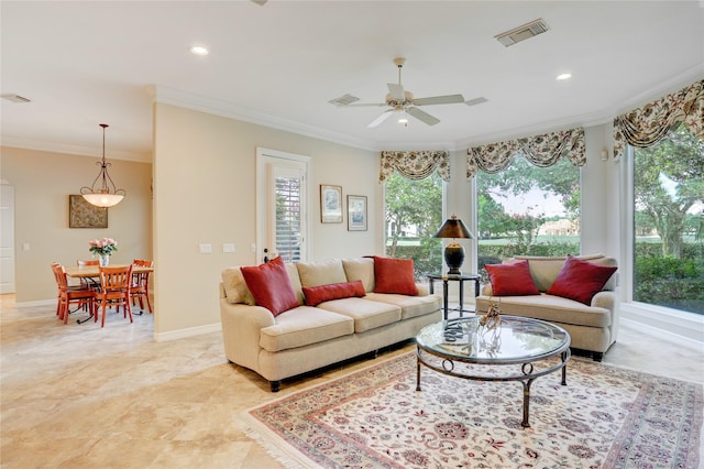 3207 Riviera Dr, Sugar Land, TX 77479 - living area featuring healthy amount of natural light, ceiling fan, ornamental molding, and recessed lighting