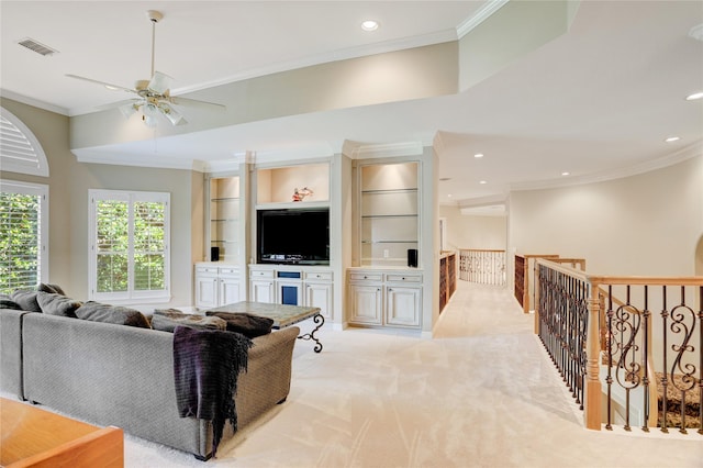 3207 Riviera Dr, Sugar Land, TX 77479 - living area featuring ornamental molding, a ceiling fan, light carpet, and recessed lighting