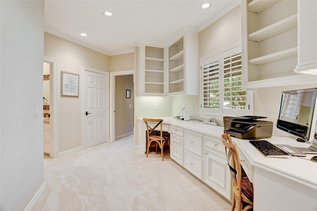 3207 Riviera Dr, Sugar Land, TX 77479 - kitchen featuring built in desk, recessed lighting, light countertops, light colored carpet, and ornamental molding
