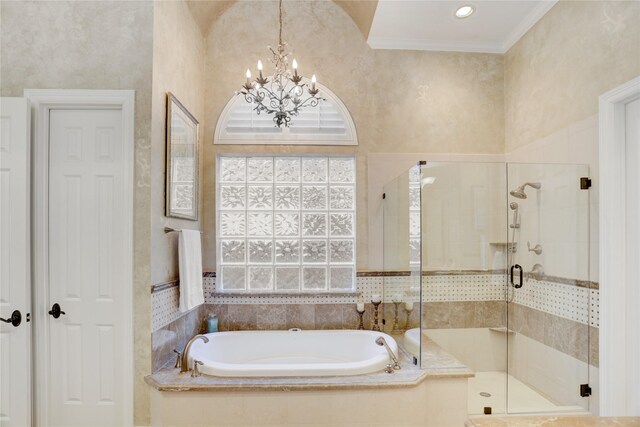 3207 Riviera Dr, Sugar Land, TX 77479 - bathroom with a garden tub, a shower stall, a chandelier, and crown molding