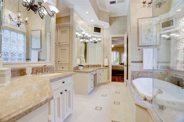 3207 Riviera Dr, Sugar Land, TX 77479 - bathroom featuring a chandelier, a bath, tile patterned flooring, two vanities, and crown molding
